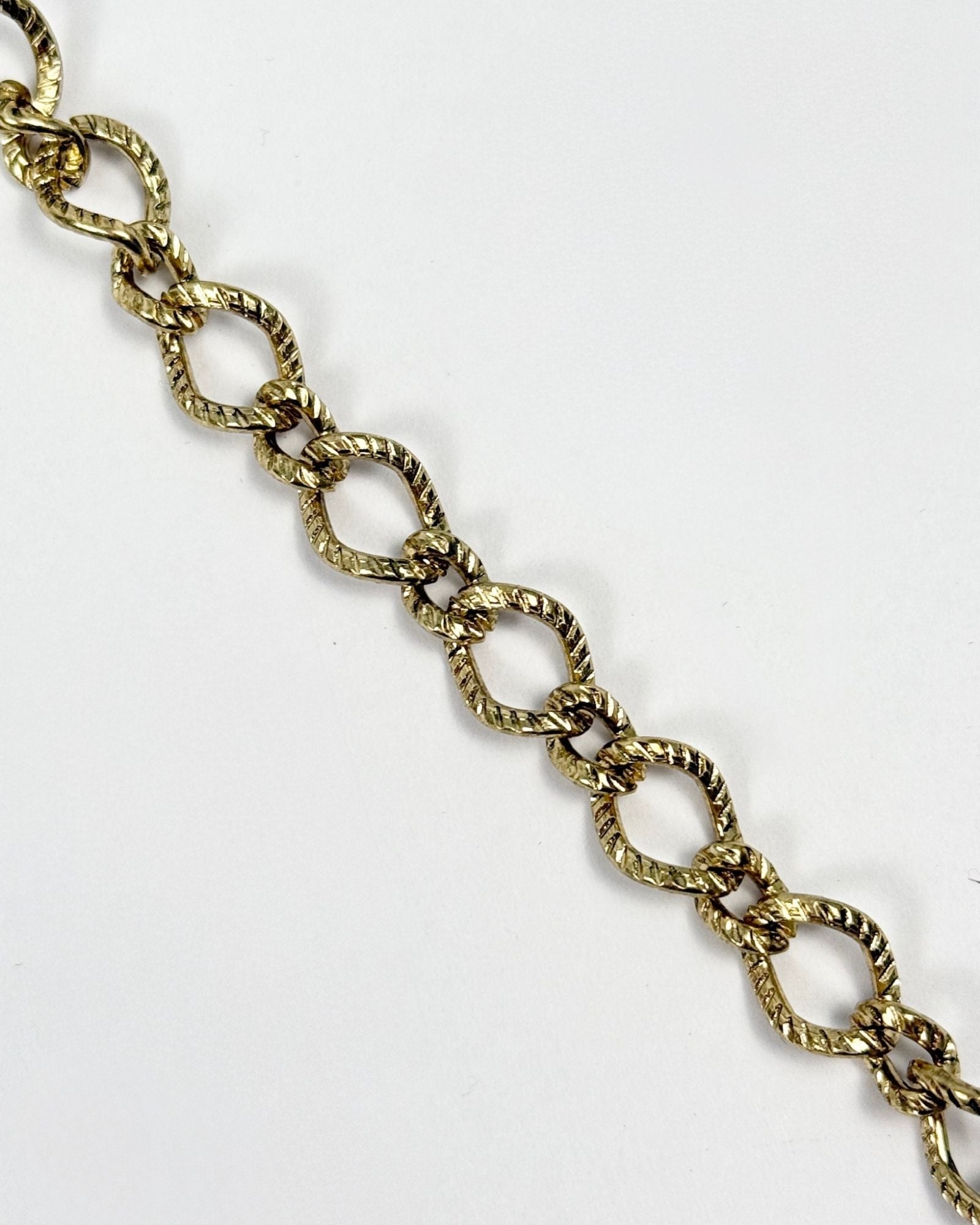 Gold chain on a white background